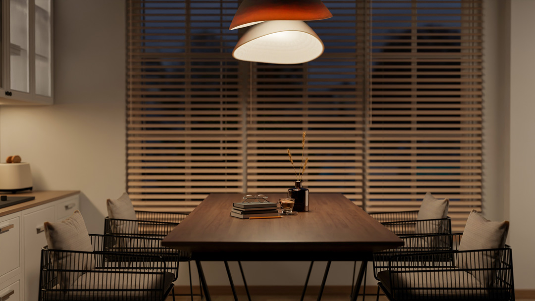 Basswood cedar venetian blind on kitchen window above a wooden table with coffee and books