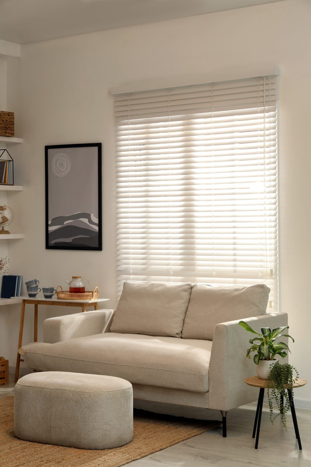 Stylish living room interior showcasing PVC Venetian blinds for adjustable light and privacy