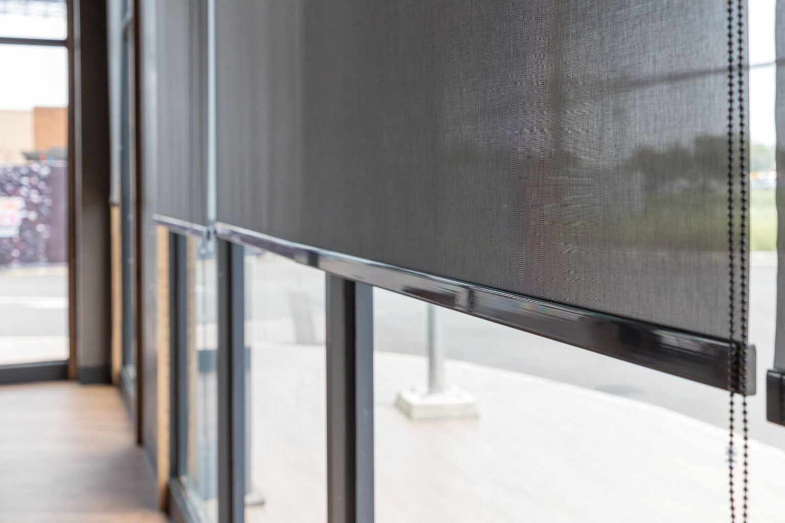 A blind curtain or black blinds Roller sun protection in office