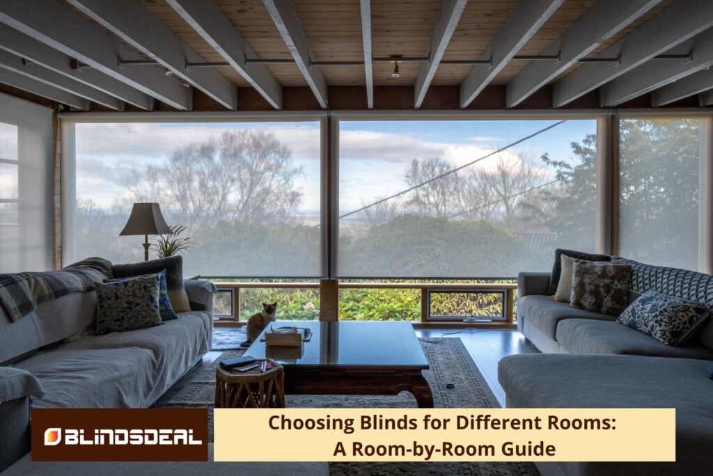White roller blinds in living area with grey couch and table lamp