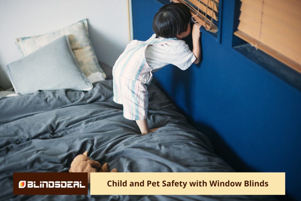 An over-the-shoulder shot of a young child standing on a bed and peering through the slats of wooden venetian blinds
