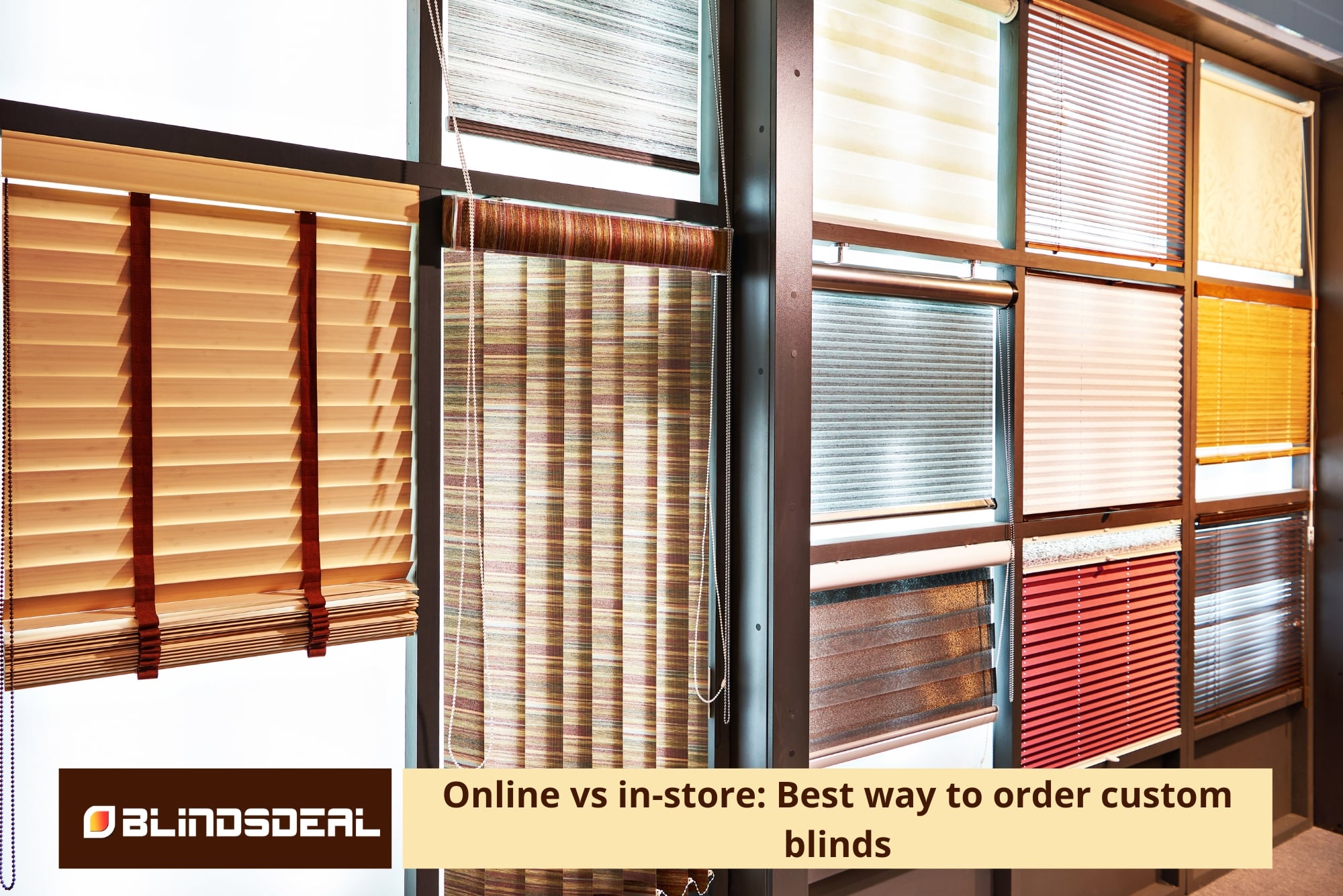A variety of custom window blinds, including Roman shades, honeycombs, and rollers, displayed on a showroom wall.